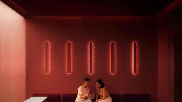 Modern breakout space with mood lighting for intimate corporate events and professional meetings.