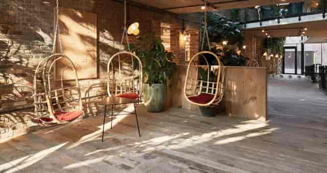 Industrial lounge space for networking workshops at London Fields Bottega.
