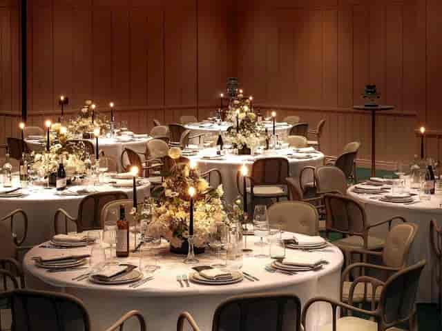Candlelit ballroom event space for corporate gala and upscale banquet at Art Play Shoreditch.