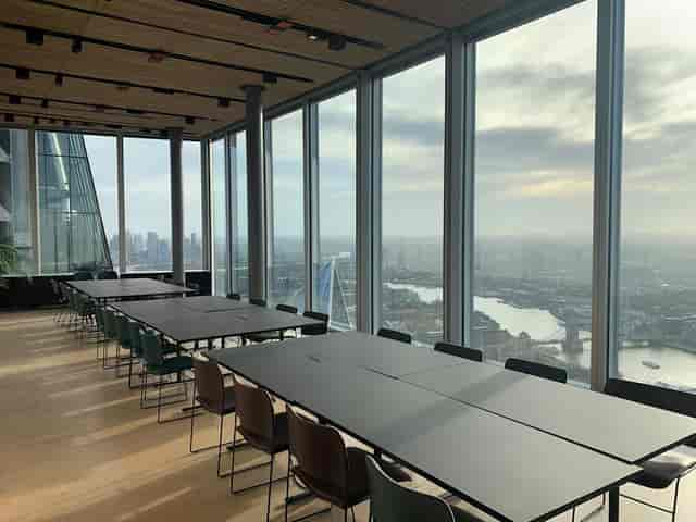 Boardroom at Art Play Shoreditch with skyline views for executive meetings and networking events.