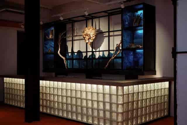 Thematic bar setup at Art Play Shoreditch for immersive reception and networking event.