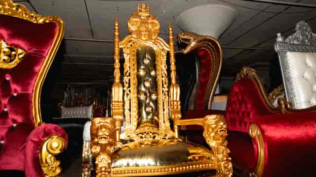 Maximalist throne rental furniture for themed galas and VIP stage setups at The Trophy Room.