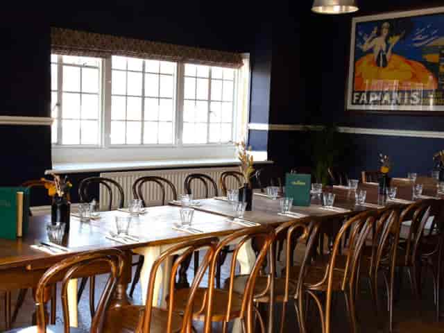 Private dining room at Main Hall, Crescent with long table for social gatherings and meetings.