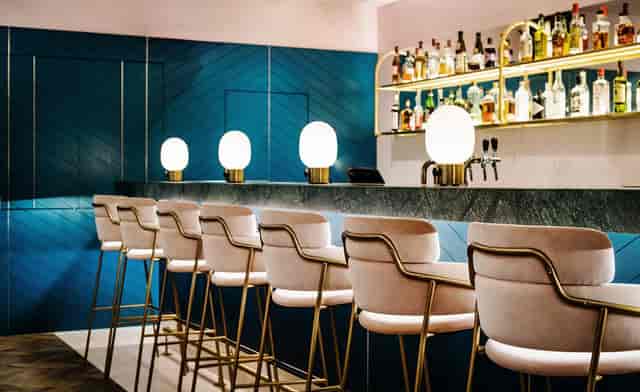Modern Grind Shoreditch bar with premium lighting, perfect for upscale networking reception venues.