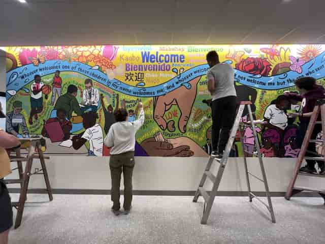 Collaborative mural in Large Hall, Abbey Wood: Team-building activity for corporate event planning.