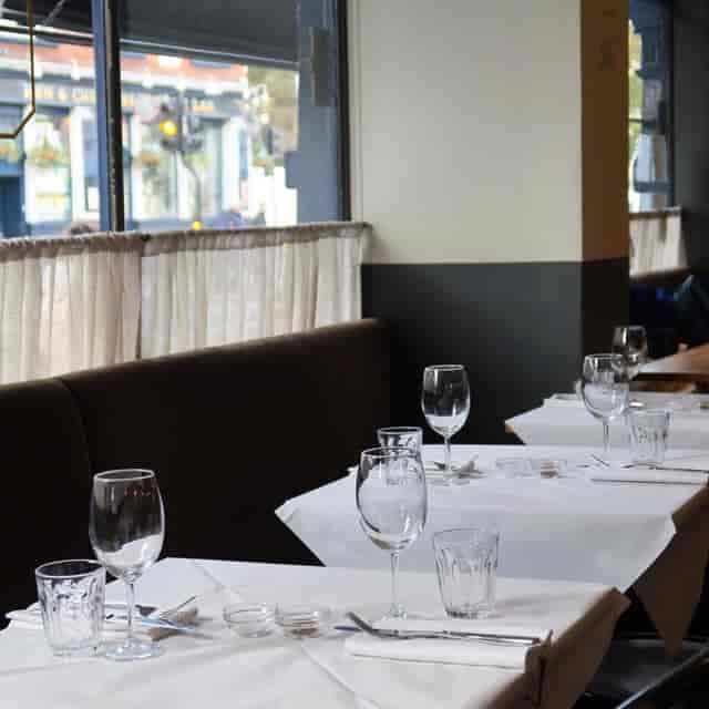 La Bottega Italian wine bar booth seating for intimate networking dinner or corporate event.
