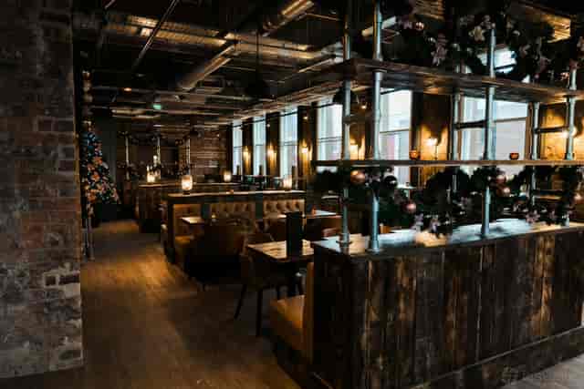 Chambers Cocktail Bar, Newcastle: Industrial-chic private dining for corporate holiday events.