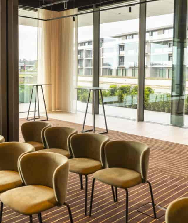 The Serpentine pre-function space with lounge seating for networking and corporate events.