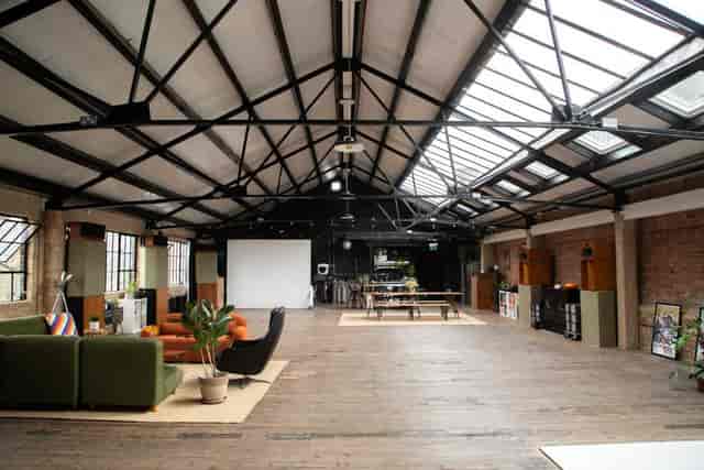 Industrial-chic Studio 3 venue in London with natural light for workshops and networking events.