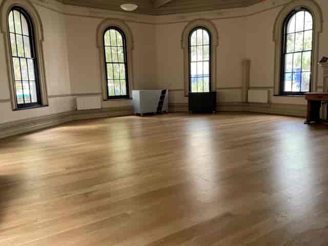 Church Room venue with arched ceilings, ideal for elegant event receptions and workshops.
