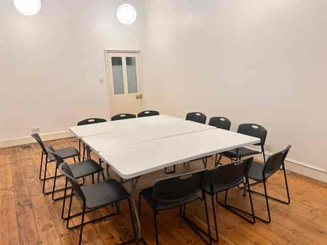 Main hall at Clapton Park URC, a functional square room for team meetings and brainstorming events.