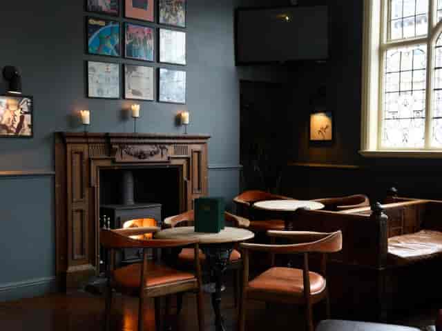 Living Room at The Mill: Heritage fireplace ideal for private corporate meetings and networking.