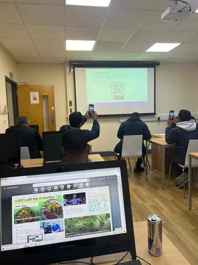Plaistow Classroom at Exam Centre London featuring a QR code for post-session feedback.