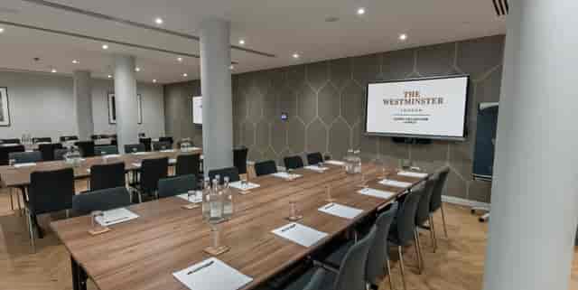 Boardroom-style meeting space at The Boothroyd, The Westminster London for corporate events.