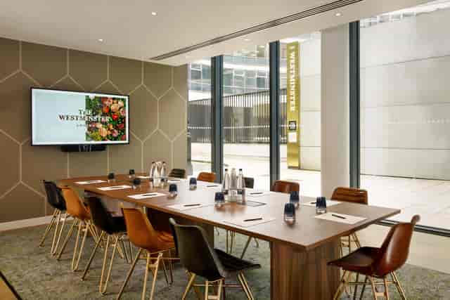Modern boardroom at Hotel Riu Plaza London, sleek corporate meeting space for strategy sessions.