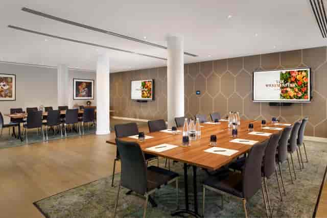 Modern boardroom at Hotel Riu Plaza London with ergonomic seating for executive business meetings.