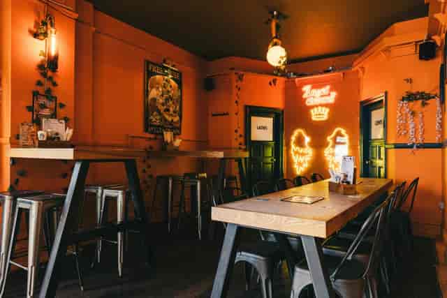 Industrial-chic breakout venue at Angel & Crown for team mixers and networking events.