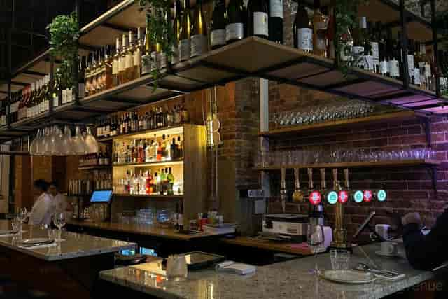 Rao’s upscale industrial dining room for corporate networking mixers and private receptions.