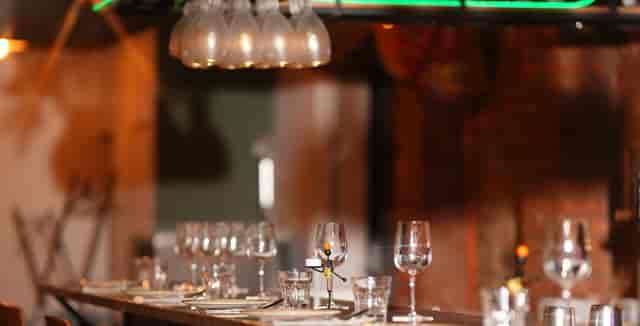 Upscale private dining room at Rao’s for corporate dinners and networking events.