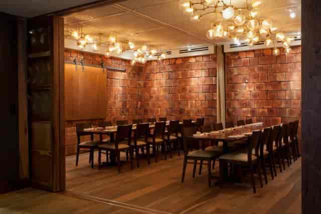 Upstairs Function Room with brick walls for intimate board dinners and business celebrations.