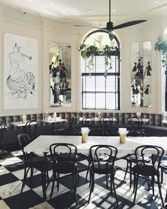 Upstairs function room with boutique decor for corporate networking and business meetings.
