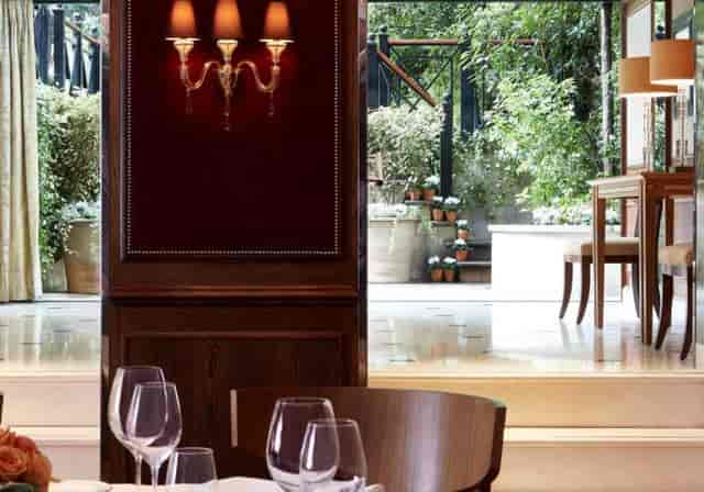 The Goring Garden Room wood-paneled interior for luxury private dining and corporate events.