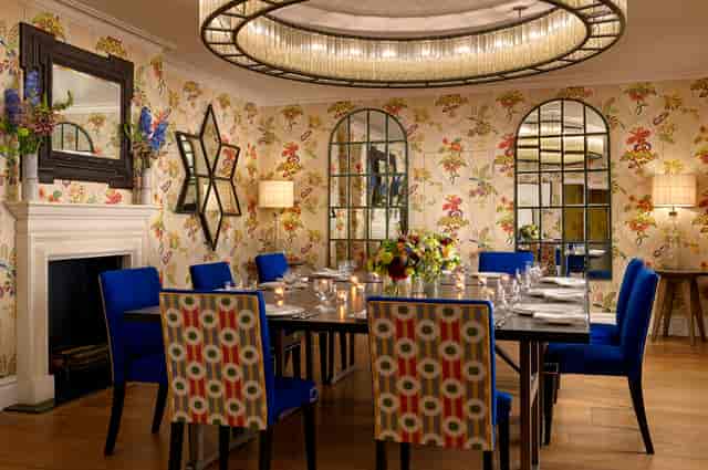 Private dining and boardroom meeting space in Brasserie Max featuring bold, modern interior design.