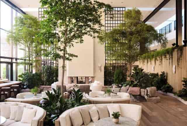 Biophilic atrium at 1 Hotel Copenhagen, ideal for upscale networking and corporate events.