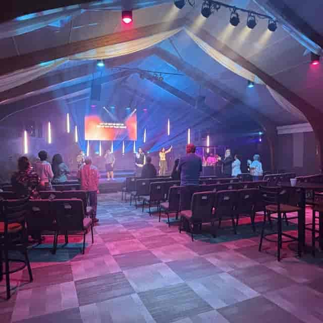 Academy 22 venue with immersive AV production and uplighting for corporate events or conferences.