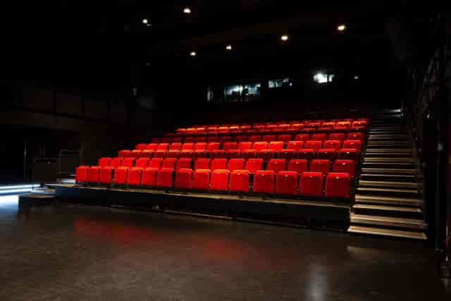 Black-box theatre at Create Centre with raked seating for events and presentations.