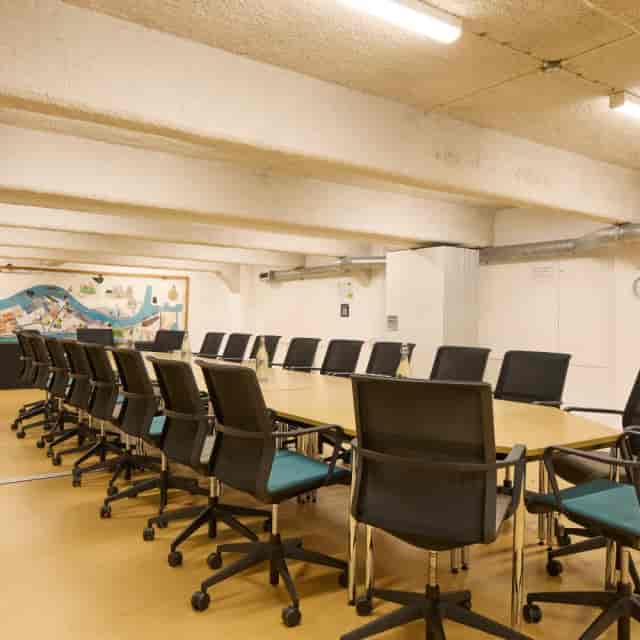 Avonmouth Suite boardroom setup: industrial meeting space for workshops and corporate conferences.