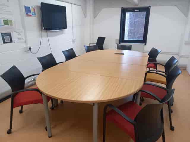 Avonmouth Suite boardroom setup: modular breakout space for corporate meetings and workshops.