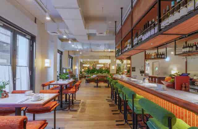 The Cardinal Bar & Kitchen restaurant venue featuring an expansive bar for corporate event hosting.