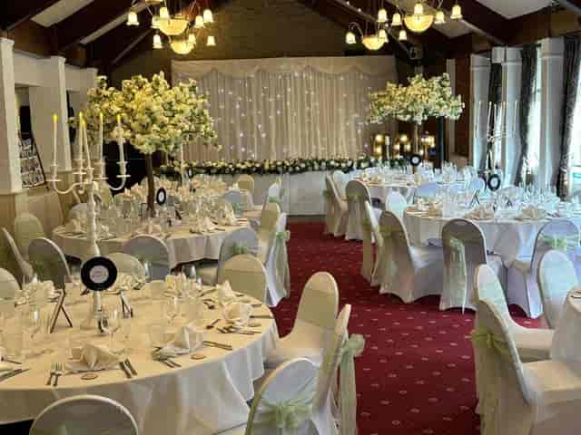 Cardinal Bar & Kitchen ballroom event space with elegant floral decor for formal party hire.