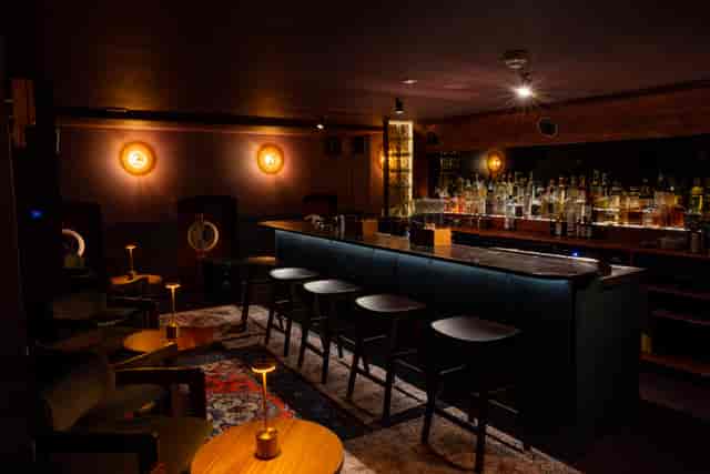 Basement Bar VIP lounge for corporate networking events with plush seating and ambient lighting.