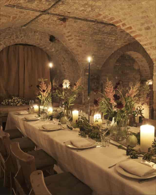 Luxury dinner in historic stone vaults at Leaf & Cane for atmospheric private event and venue hire.