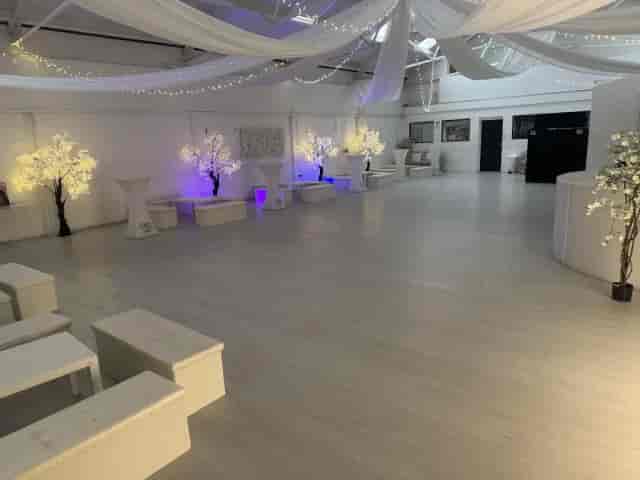 Main Hall event space with cherry blossom decor for networking receptions and cocktail hours.
