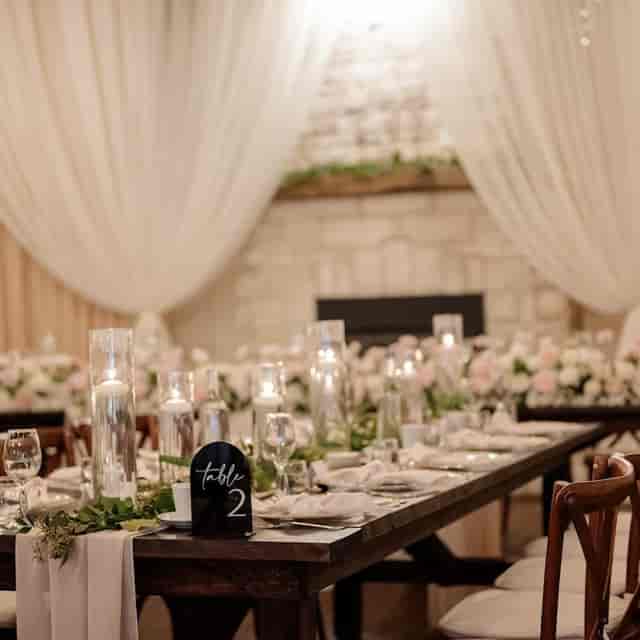 Elegant banquet table with rustic-chic decor at Mitcham Golf Club for wedding or private event.