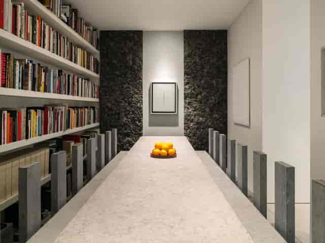 Minimalist boardroom in Paper Garden for executive strategy meetings and private dining events.