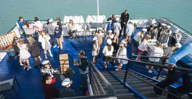 Golden Star private boat deck reception featuring giant Jenga for corporate networking events.