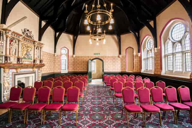 Historic Ealing Central Library theater venue with ornate fireplace for seminars and meetings.