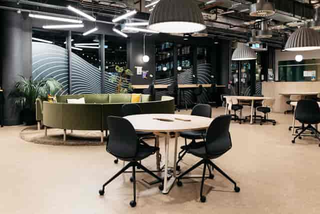 Modern Pancras Square Library breakout space with meeting pods for workshops and networking.