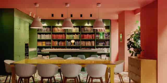 Modern community library breakout room for creative brainstorming and networking events.