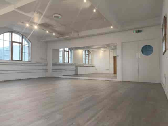Ground floor studio at Harbinger Primary School with wall mirrors for fitness and wellness events.