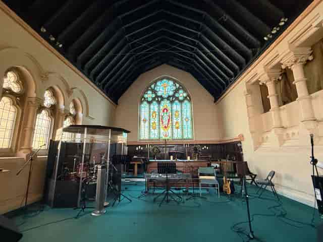 Main Hall at Park Lane Methodist Church: stained glass venue for events and stage performances.