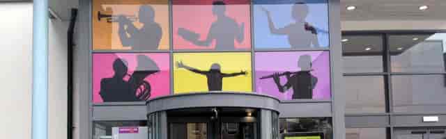 Cosmo Rodewald Concert Hall window branding for performance arts and live music events.