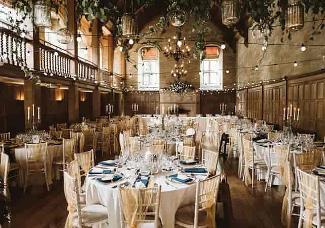 Drumossie Suite banquet layout with string lighting for luxury wedding and gala events.