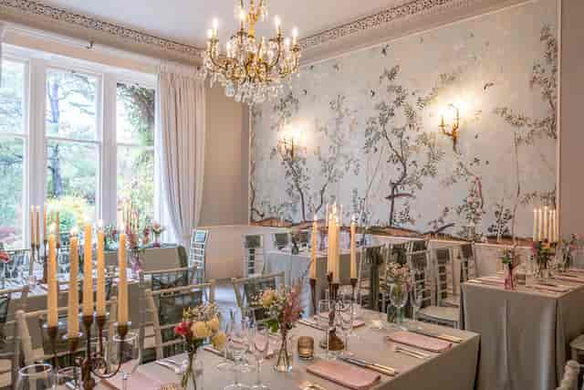 Matilda's Room with neoclassical murals, perfect for micro-weddings and luxury board dinners.
