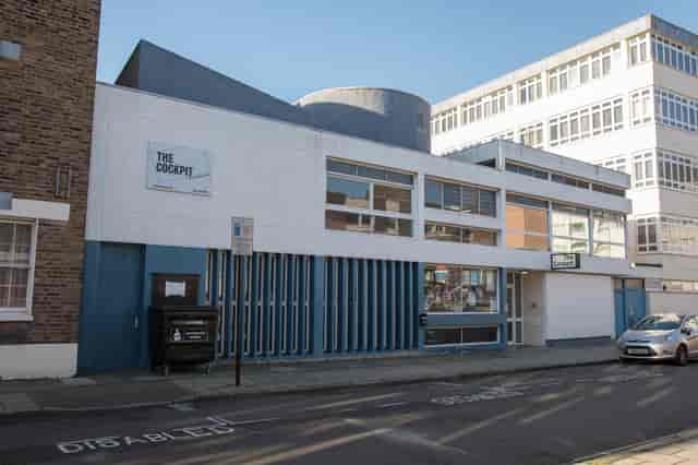 Cockpit auditorium with intimate black box architecture for creative workshops and rehearsals.