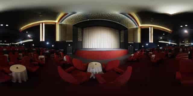 Cabaret-style theatre auditorium with intimate seating for corporate events and awards ceremonies.